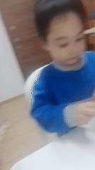 Children observed in kitchen scene in Lemesos, Cyprus