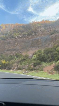 Driver travels winding Madeira highway between Santana and Funchal
