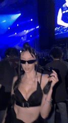 Masked DJ performs outdoor nighttime concert in Belgrade suburb