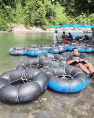 River tubing session on a rocky Indonesian waterway