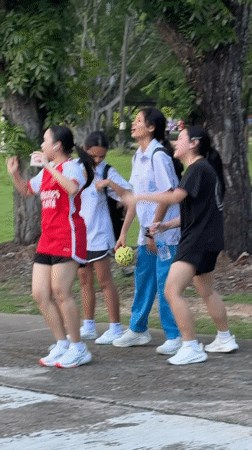 Outdoor Zumba class fills a blue court in Phuket City