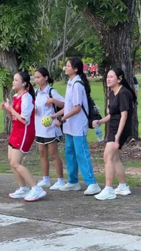Outdoor Zumba class fills a blue court in Phuket City
