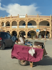 Ordinary street life documented across Kandahar on sunny afternoon