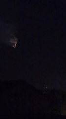 Lightning, moon, and mystery object over Viadana on a stormy night