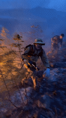 Wildfire spreads across hillside in Vranjina at dusk