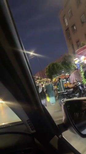 Night market activity captured in Marrakesh streets