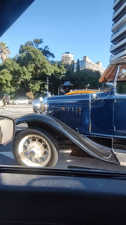 Vintage blue convertible spotted at Buenos Aires intersection