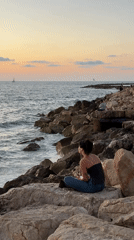 Evening gathering at Tel Aviv waterfront skatepark and coast