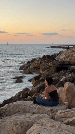 Evening gathering at Tel Aviv waterfront skatepark and coast