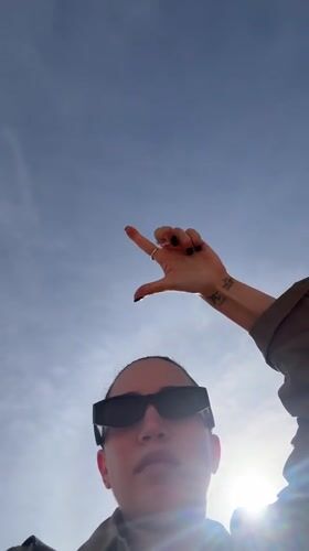 Tourist films selfie video at Great Pyramid of Giza