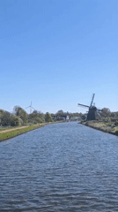 Peaceful canal scene documented in Alkmaar, Netherlands
