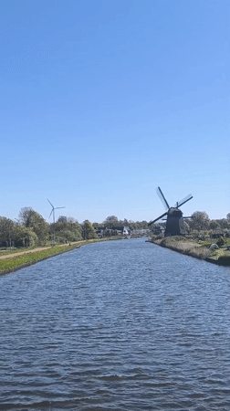 Peaceful canal scene documented in Alkmaar, Netherlands