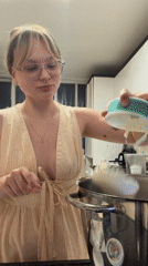 Woman bakes cake in Tel Aviv kitchen Friday afternoon