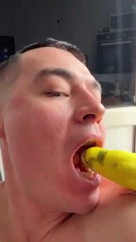 Man and pet parakeet share intimate moments in Anapa home