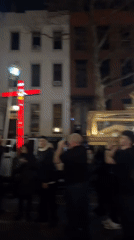 Nighttime Religious Procession Carries Statue Through NYC Streets