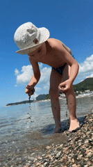 Child enjoys beach time on Russian coast