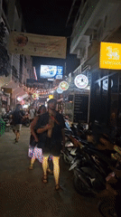 Busy nighttime street scene captured in Ko Tao, Thailand