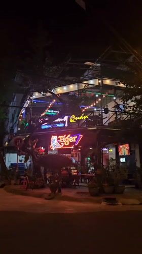 Outdoor bar with Tiger signage observed in Nha Trang