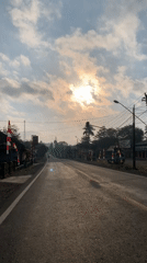 Driving through a quiet paved road in rural Panulisan Timur