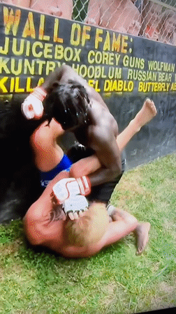 MMA grappling match observed outdoors in Buenos Aires