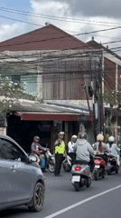 Morning traffic flows through busy Ubud streets