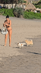 Man enjoys wine on North Kuta beach Sunday morning