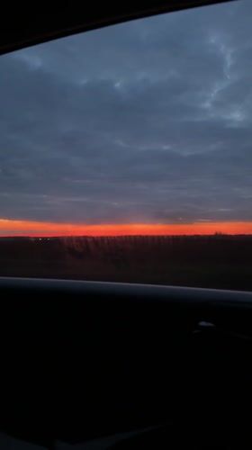 Motorist Records Rural Sunset in Bulgarian Countryside