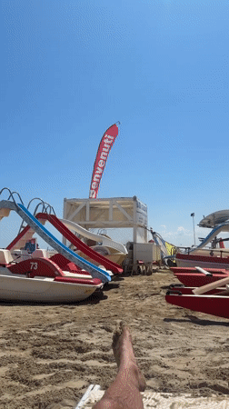 Swimming and lounging on Rimini's Adriatic beach