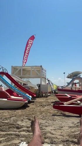 Swimming and lounging on Rimini's Adriatic beach