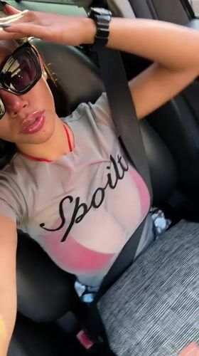 Woman records car selfie video in Botany, Australia