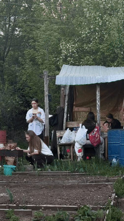 Young women gather at makeshift shelter in Perm, Russia