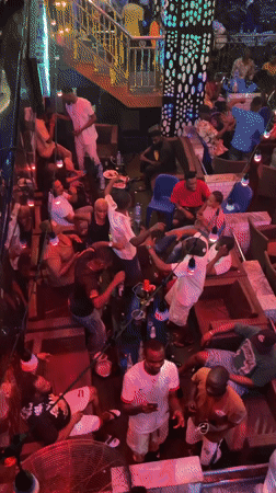 Nightlife scenes documented at Nigerian bars and clubs