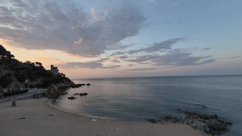 Sunrise at Lloret de Mar's beach and castle