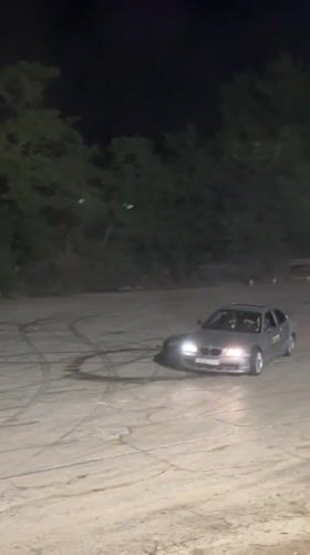Cars and bikes drift a dark lot in Veliko Tarnovo