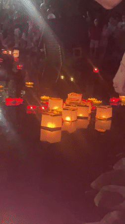 Floating lantern festival lights up Brest waterfront at dusk
