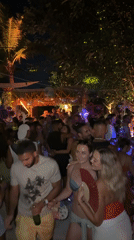 Nighttime beach party documented in Mengwi, Indonesia