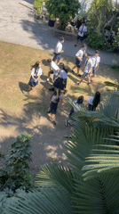 Students at a Mojokerto school hang out and play outdoors