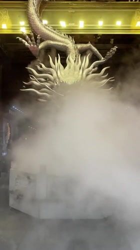 Silver dragon sculpture draws crowds in Shanghai display