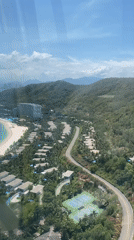 Aerial footage captures tropical resort complex on coastline