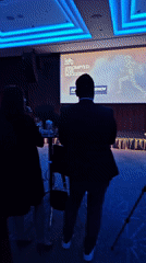 Man delivers presentation in Sofia conference room