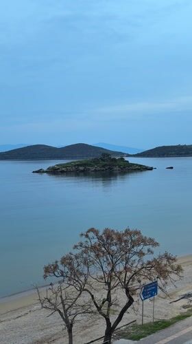 Quiet coastal moment captured at Nea Peramos beach