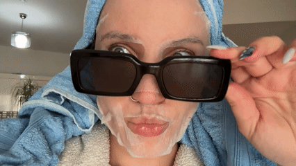 Person conducts morning self-care routine in Esenyurt kitchen