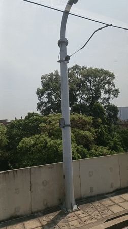 Morning cityscape view captured from elevated transport in Dhaka