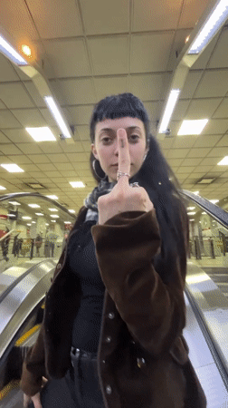 Woman observed on transit escalator in Buenos Aires