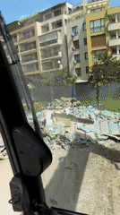 Construction vehicle operates at demolition site in Nesebar