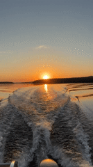 Sunset observed from boat on water near Votkinsk, Russia