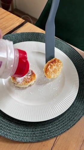 Russian cottage cheese pancakes prepared and served in Vaskelovo