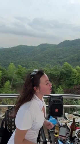 Pool day in Yiwu, kids and adults, hills in the background
