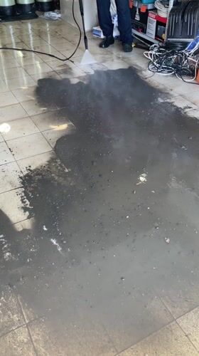 Pressure washing cleaning operation documented in Sharapovo, Russia