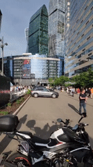 Moscow street scenes captured from motorcycle, pedestrian perspectives